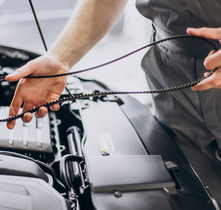 Repair man making car service